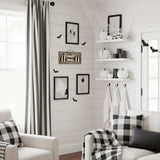 Hand-painted black and white pumpkin wall sign with resin finish by Blue Bourbon Designs