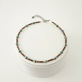 Handmade brown and iridescent green glass bead ankle bracelet by Blue Bourbon Designs