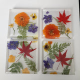 floral resin coasters set of four, handmade by Blue Bourbon Designs
