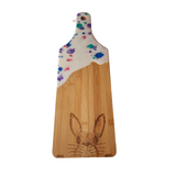 One-of-a-kind bamboo serving board with resin handle and hand-drawn rabbit