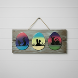 Hand-painted Easter egg sign with bunny silhouettes and resin finish by Blue Bourbon Designs
