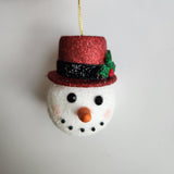Handcrafted snowman ornament with snowy texture and glitter hat by Blue Bourbon Designs