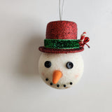 Handcrafted snowman ornament with snowy texture and glitter hat by Blue Bourbon Designs