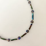 Handmade iridescent teal and purple glass bead ankle bracelet by Blue Bourbon Designs.