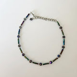 Handmade iridescent teal and purple glass bead ankle bracelet by Blue Bourbon Designs.