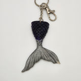 Hand-poured resin mermaid tail keychain in unique colors.