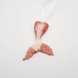 Hand-poured resin mermaid tail ornament in multiple colors.