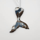 Hand-poured resin mermaid tail ornament in multiple colors.