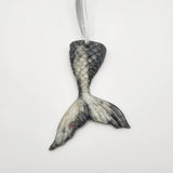 Hand-poured resin mermaid tail ornament in multiple colors.