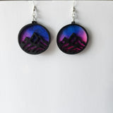 One-of-a-kind mountain earrings made from laser cut wood and resin with stainless steel hooks