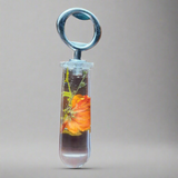Clear resin bottle opener with orange floral flowers