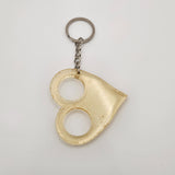 Hand-poured resin self defense keychain in unique colors and shapes