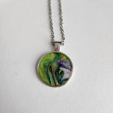 1-inch round resin necklace on silver stainless steel chain