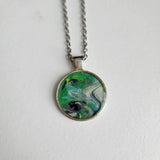 1-inch round resin necklace on silver stainless steel chain