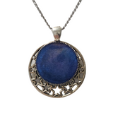 Round metal crescent moon and star pendant with resin center on stainless steel chain