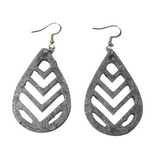 A pair of silver chevron-patterned teardrop earrings on stainless steel hooks.