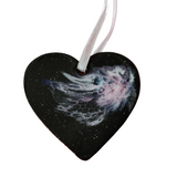 Handmade space heart ornament with black resin base and galaxy swirls by Blue Bourbon Designs.
