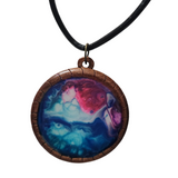 1.5 inch round wood pendant with resin-filled center on leather cord